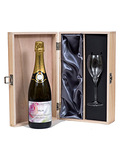 Champagne with flute in wooden box