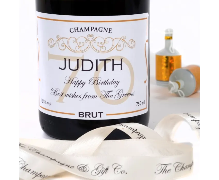 Champagne bottle with 70th birthday label